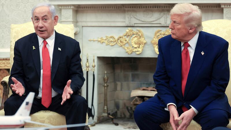 FILE - President Donald Trump, right, listens as Israel's Prime Minister Benjamin Netanyahu...