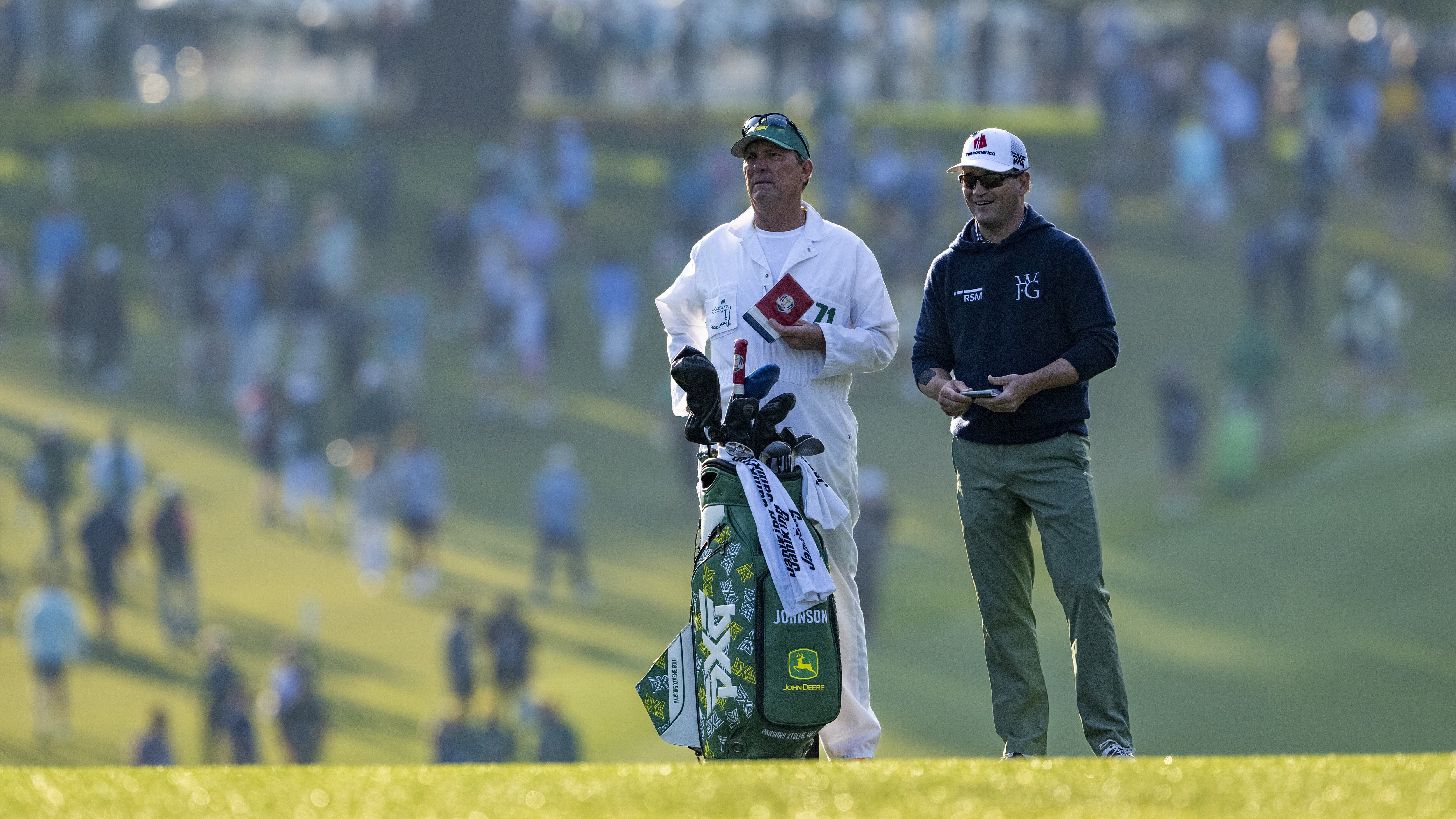 Masters champion Zach Johnson of the United States prepares to plays a stroke on the No. 1...