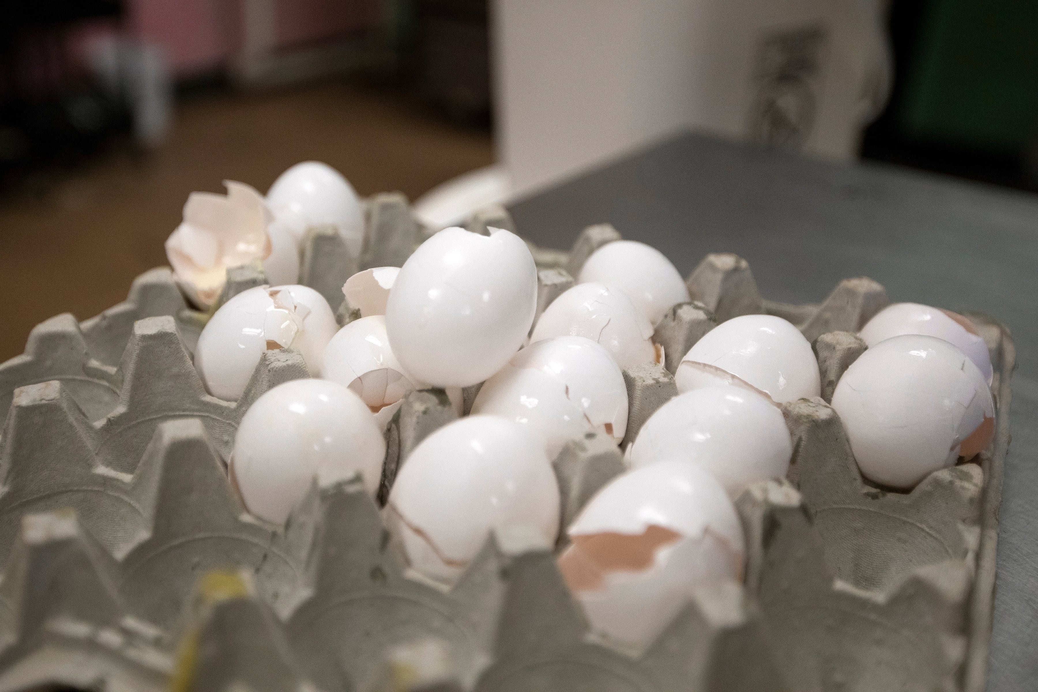 A stack of eggshells, freshly cracked by TC Bakery manager Gabriel Garmon to be mixed in a...