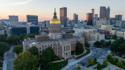 FILE - The gold dome of the Georgia Capitol gleams in the sunlight in Atlanta, Aug. 28, 2022....