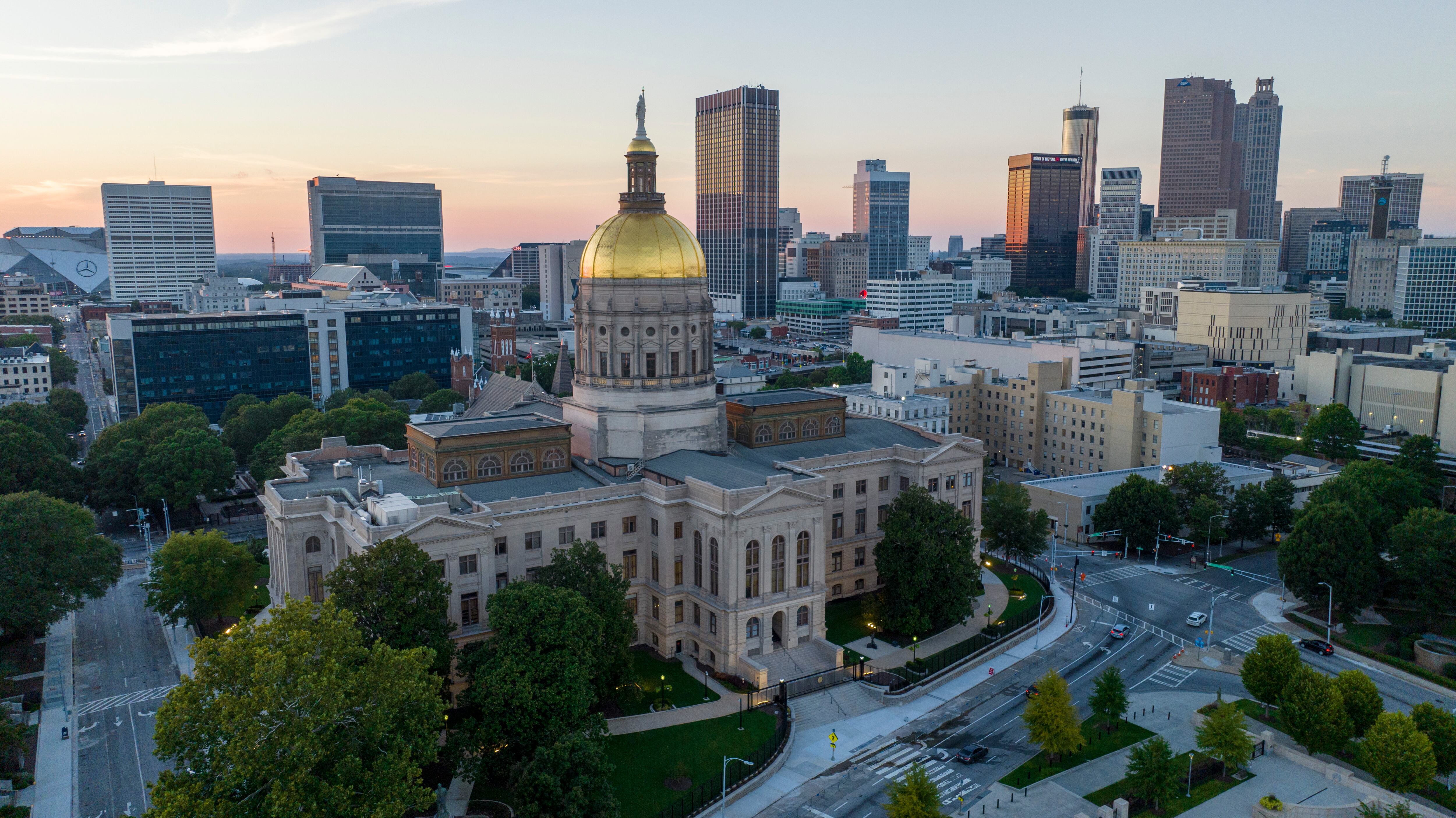 FILE - The gold dome of the Georgia Capitol gleams in the sunlight in Atlanta, Aug. 28, 2022....