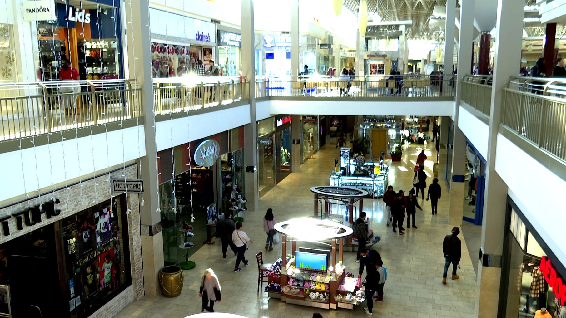 Shoppers stroll through Augusta Mall on Black Friday 2021.