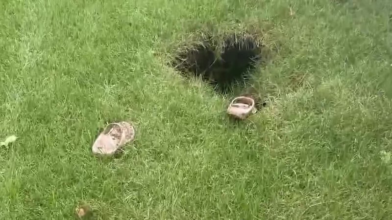 A New York woman spent part of her 47th birthday stuck in a hole in her own backyard. (Source:...