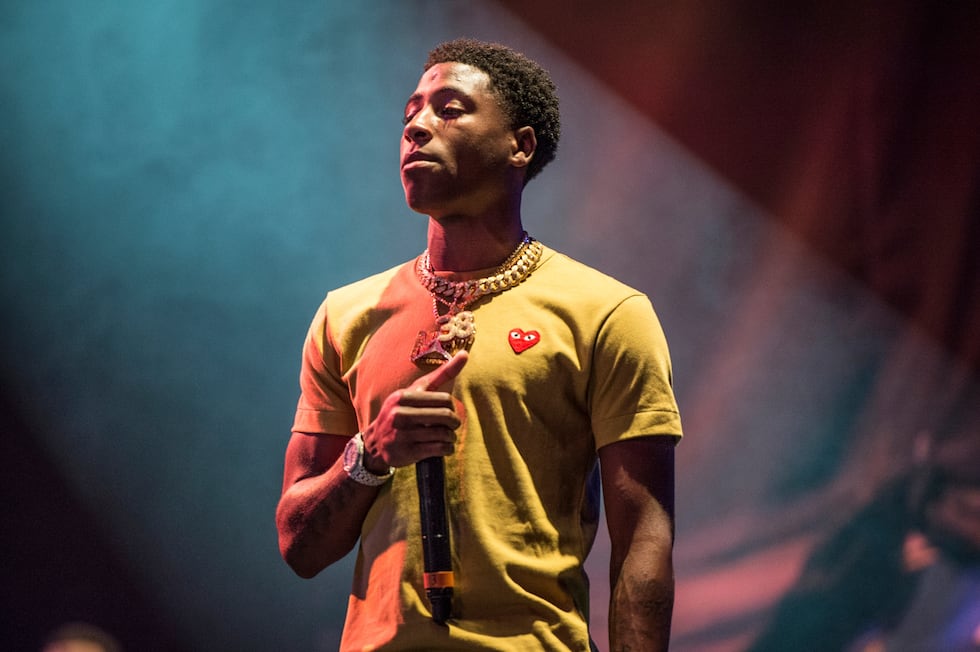 FILE - NBA YoungBoy performs at the Lil' WeezyAna Fest at Champions Square, on Aug. 25, 2017,...