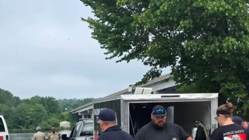 A body was found in a Hancock County lake Saturday, according to the Baldwin County Dive Team.