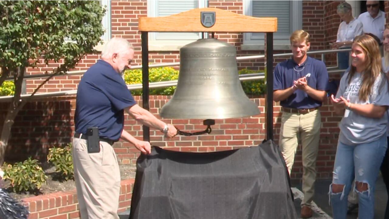 Dr. Brooks Keel rings bell on last day