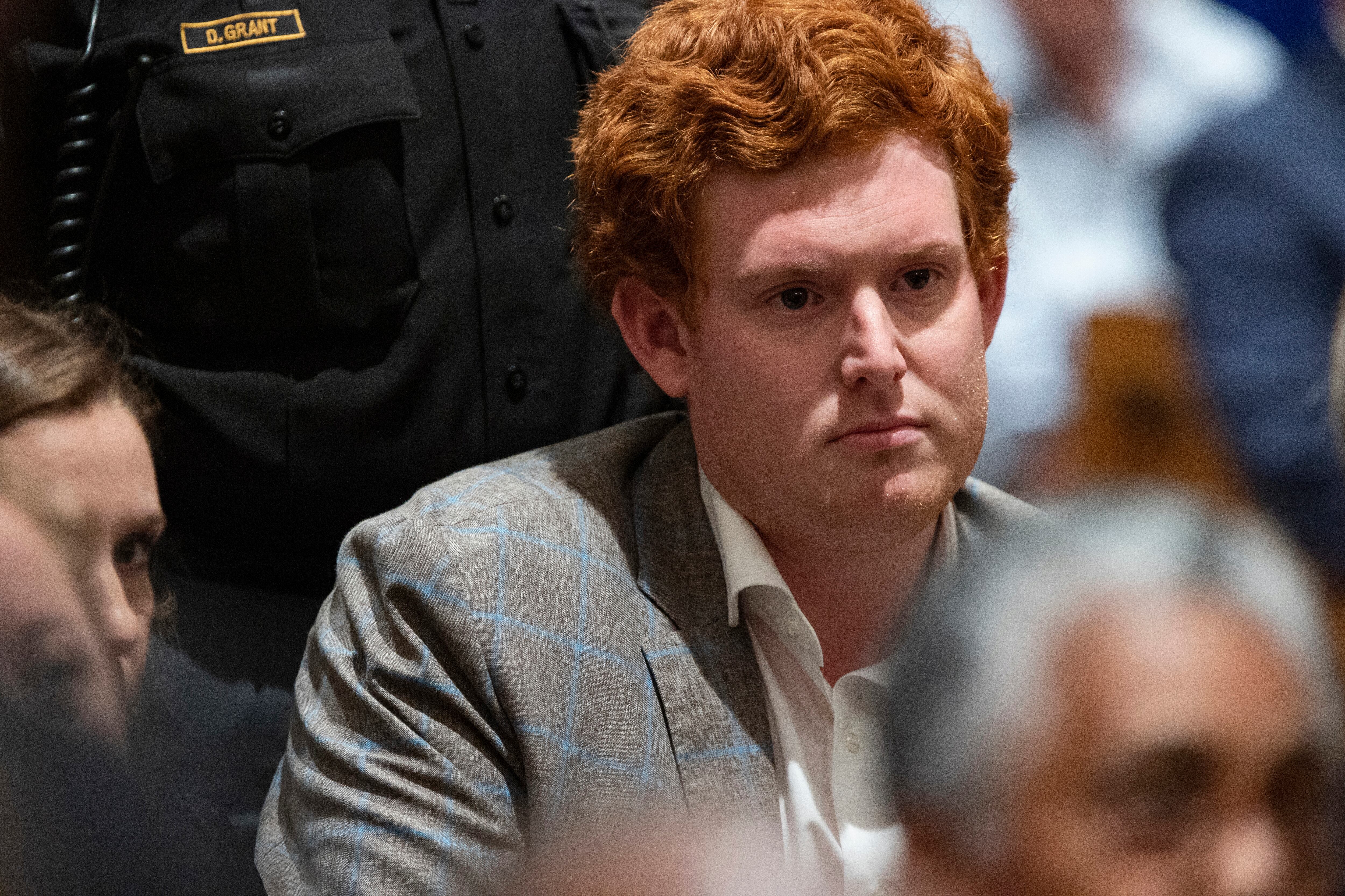 Buster Murdaugh, the son of Alex Murdaugh, listens as Alex Murdaugh's verdict is read at the...