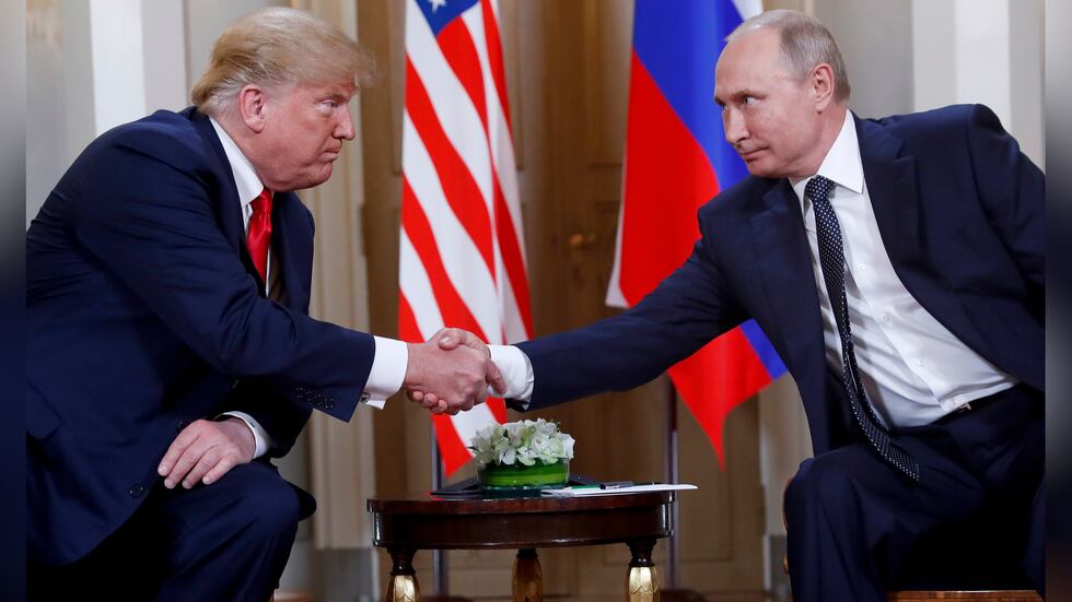 FILE - In this Monday, July 16, 2018, file photo, U.S. President Donald Trump, left, and...