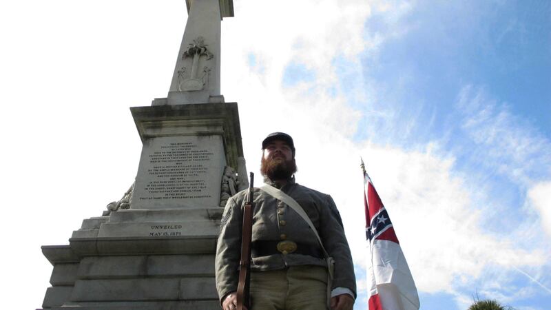 FILE - In this July 10, 2017, file photo, Cameron Maynard stands at attention by the monument...