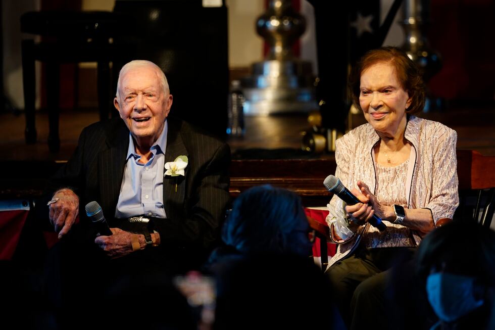 FILE- Former President Jimmy Carter and his wife former First Lady Rosalynn Carter sit...