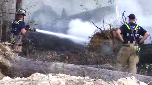 Crews battle a brush fire on Milledgeville Road on Feb. 28, 2025.