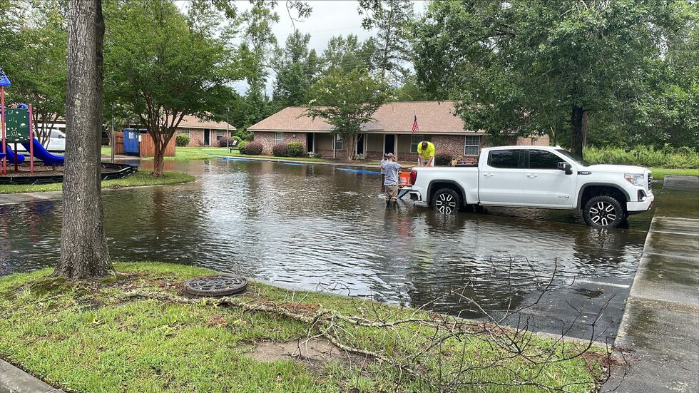 There was flooding all around Fairfax Gardens Apartments at 772 Saluda Ave., on Wednesday in...