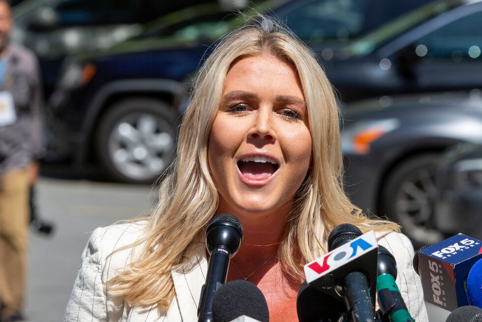 FILE - Karoline Leavitt speaks to the news media across the street from Republican...