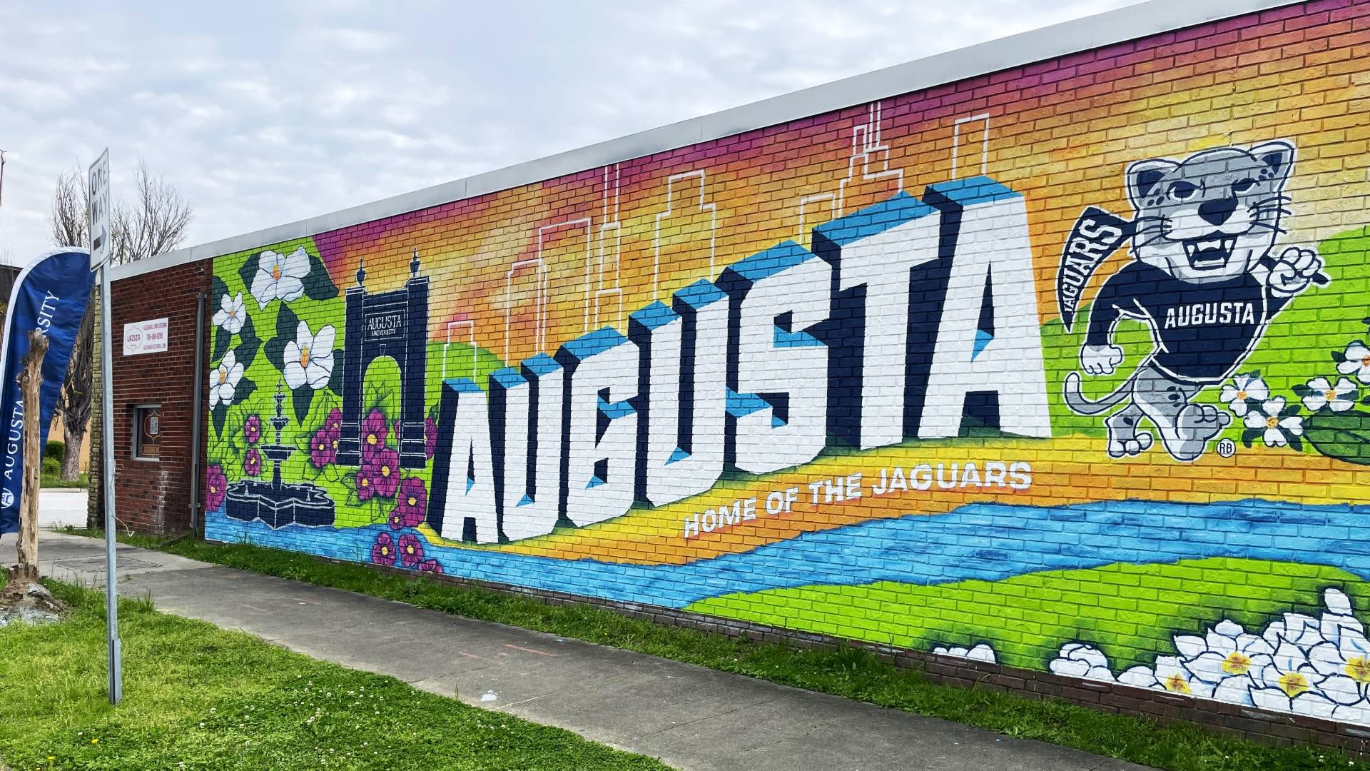 Completed mural was unveiled at noon Monday at 11th and Reynolds streets directly across the...