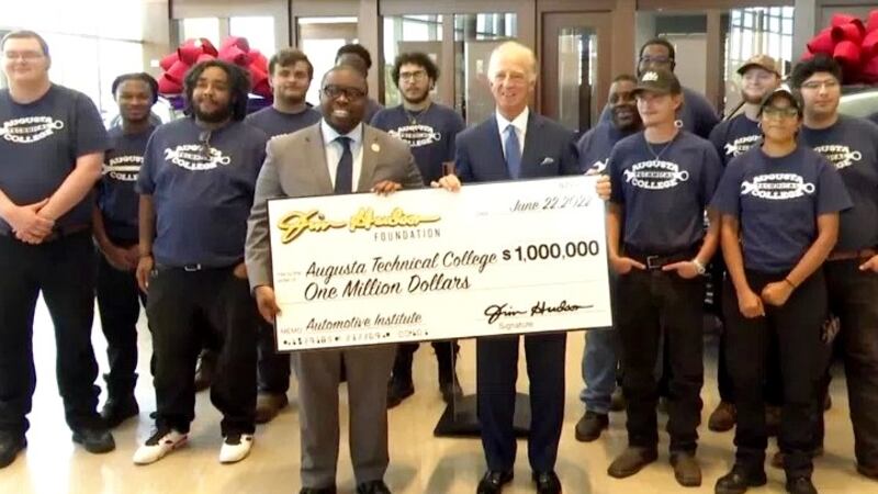 A $1 million check is presented to Augusta Tech for its automotive training program.