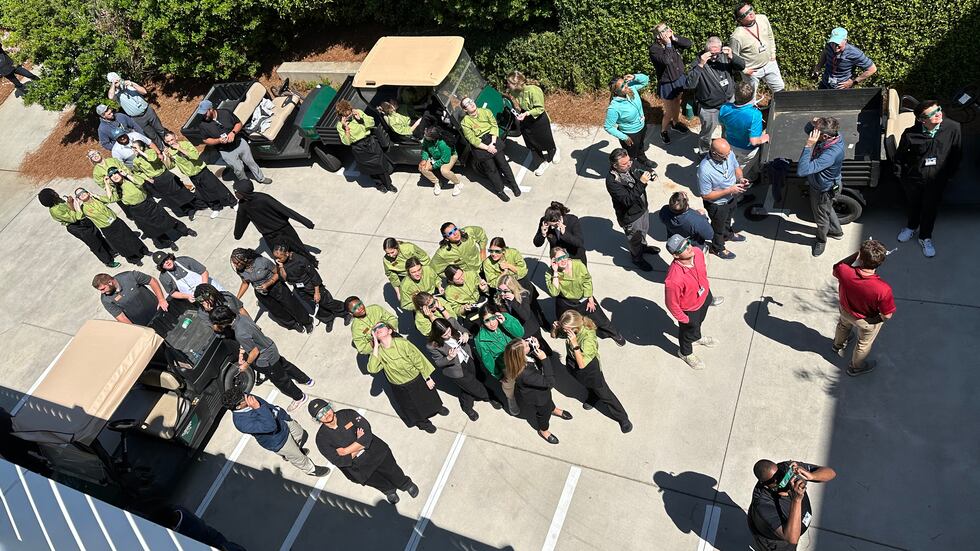 Augusta National Golf Club employees even took a moment to look at the phenomenon.