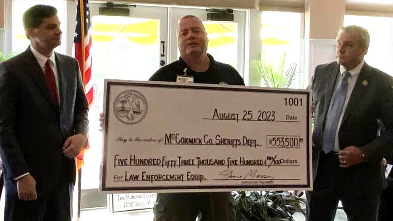 McCormick County Sheriff Clarke Stearns received a check for $553,000 presented by state Sen....