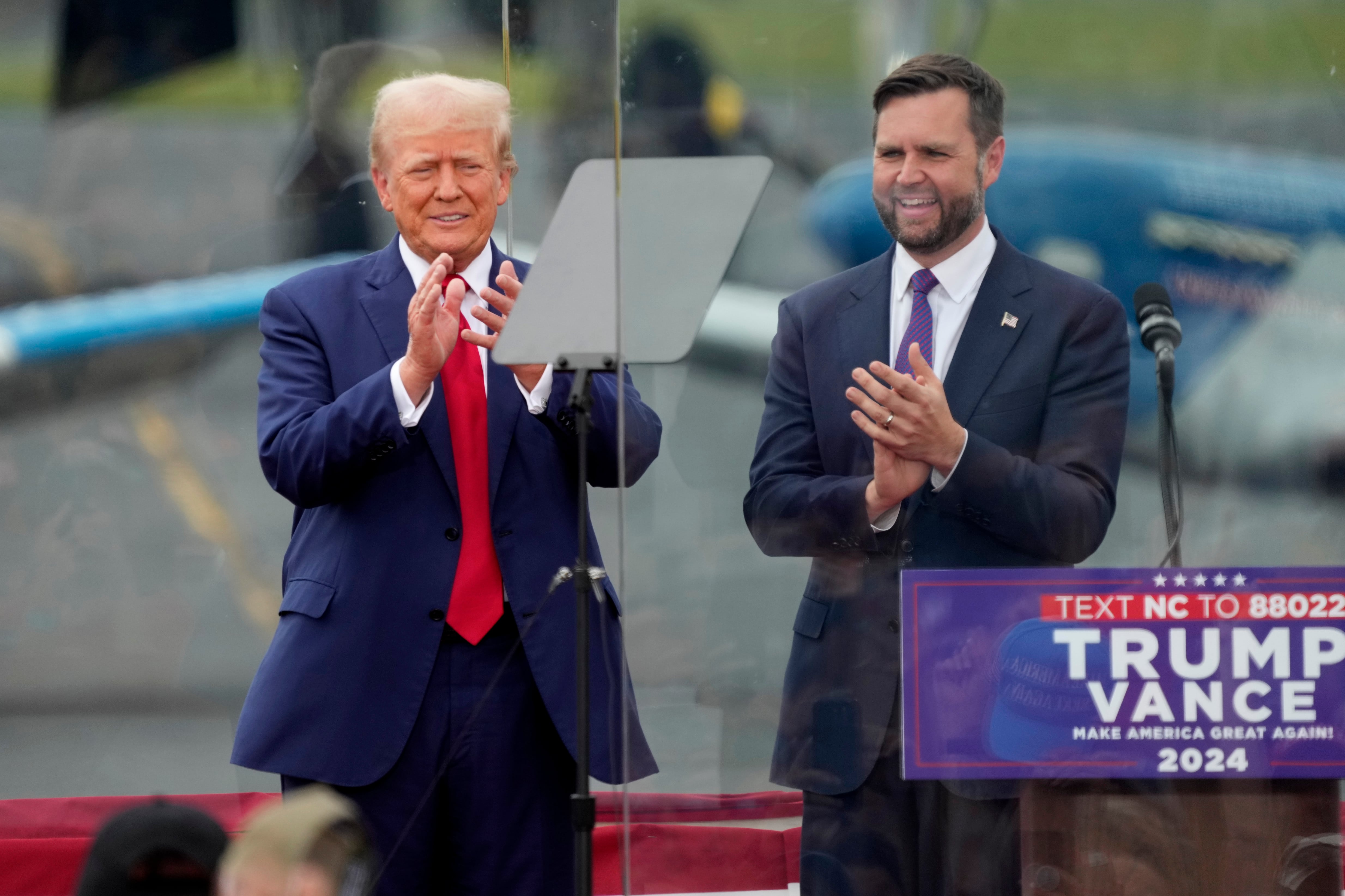 Republican presidential nominee former President Donald Trump, left, and Republican vice...