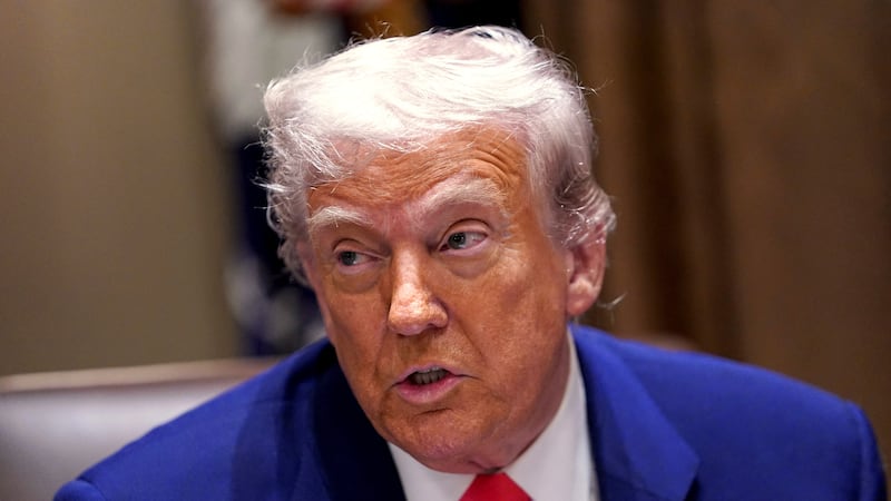 President Donald Trump speaks at a cabinet meeting in the Cabinet Room of the White House,...