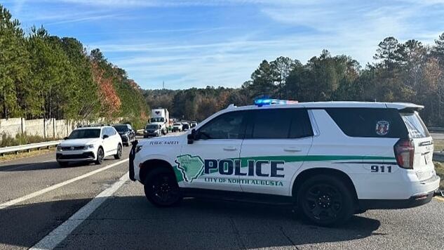 Multi-tractor trailer spills hazardous material on I-20
