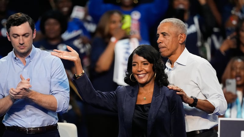 Democratic gubernatorial candidate Keisha Lance Bottoms, center, waves supporters joined by...