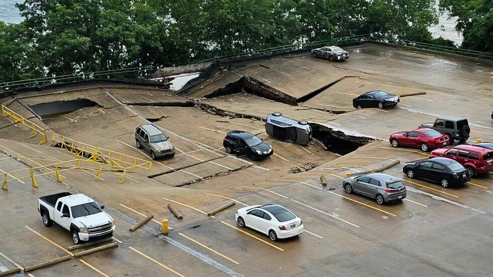 A photo of the collapsed garage outside Catherine Cruz's apartment the morning after the...