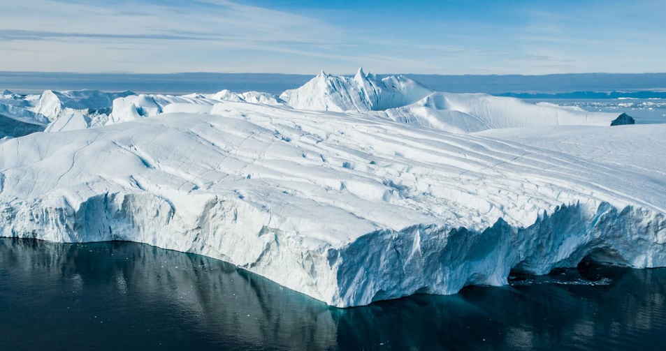 Global Warming and Climate Change - Giant Iceberg from melting glacier in Ilulissat,...