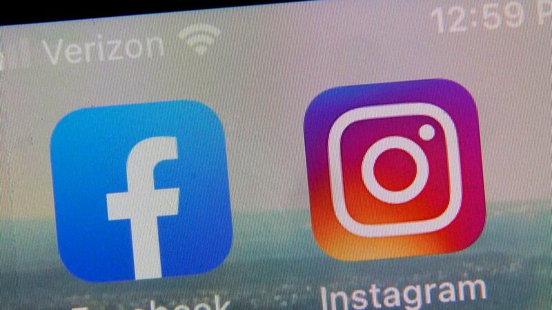 FILE - A view of the mobile phone app logos for, from left, Facebook and Instagram in New...