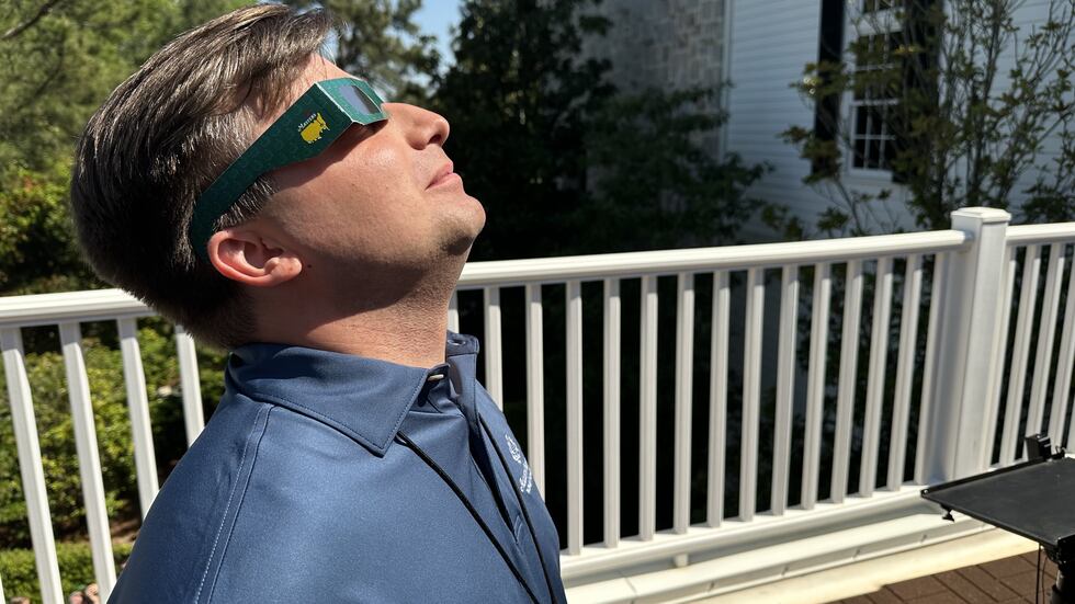 News 12 Sports Director Dan Booth checks out the eclipse.