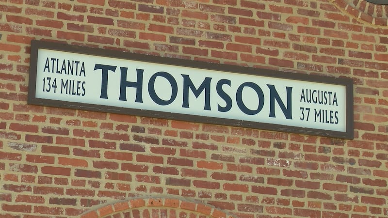 This sign on the train depot welcomes visitors to Thomson, Georgia.