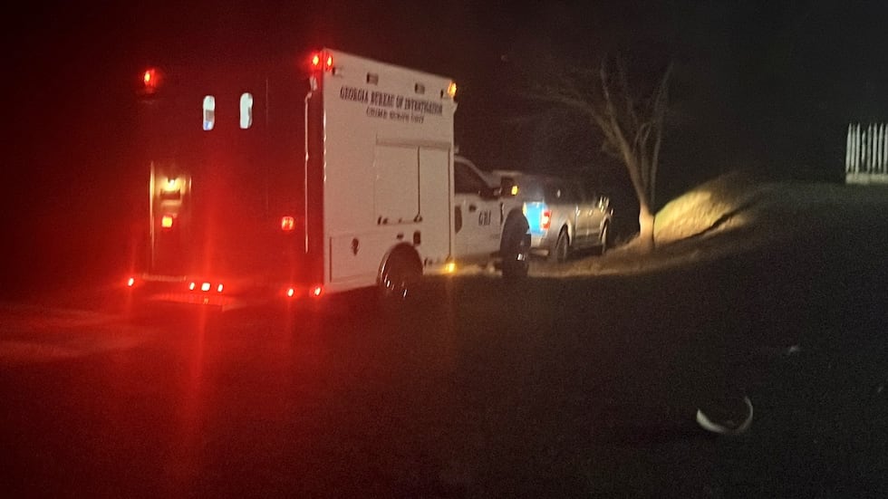 There was a GBI presence into the night at the scene of a triple murder on Mallorysville Road...