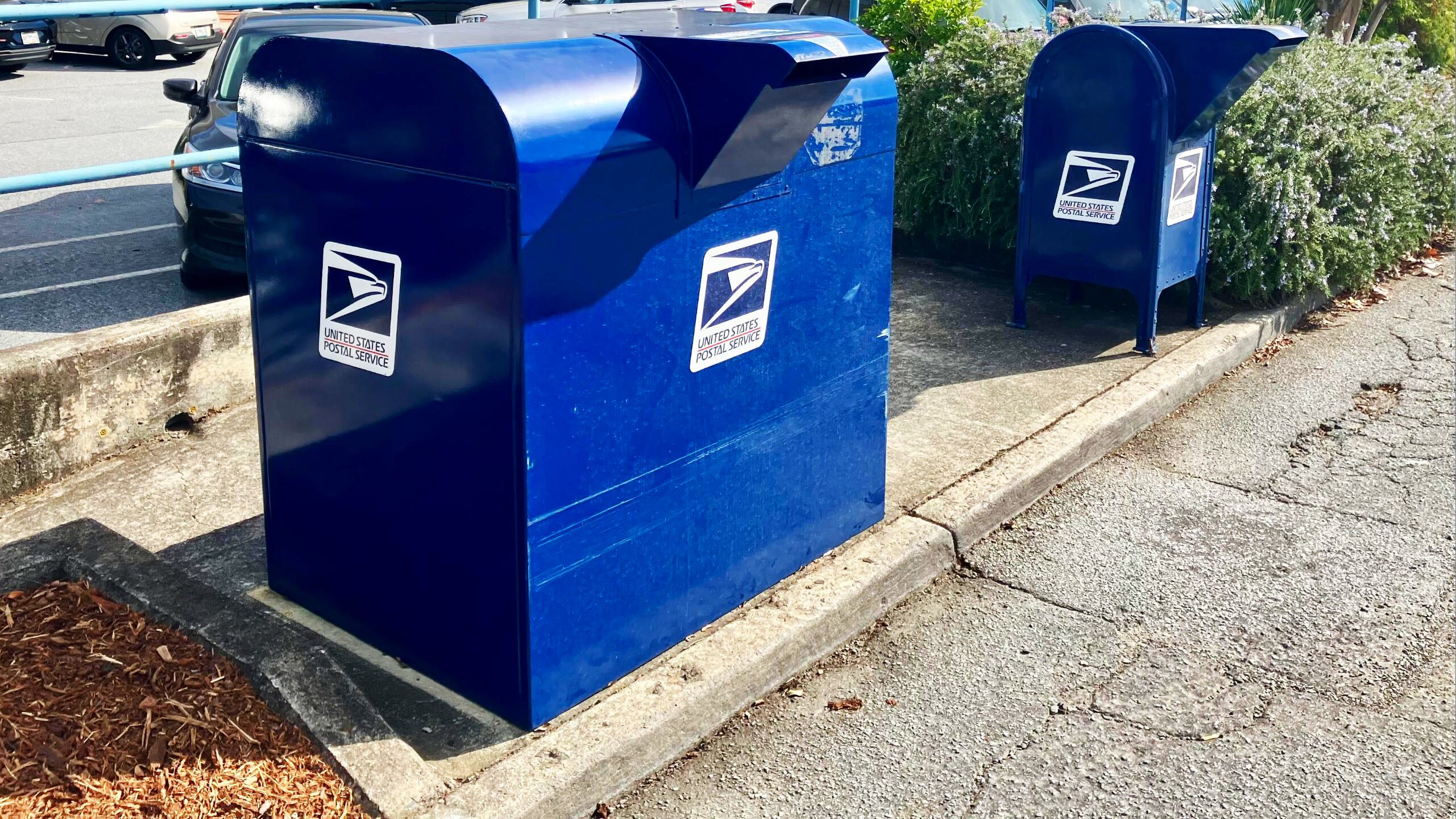 Blue postal drop boxes