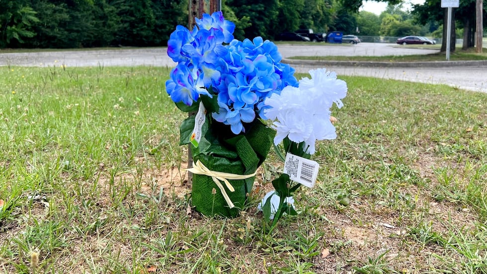 Flowers are displayed in memory if Jakwan Gunter on June 13, 2022, at Carrie J. Mays Park.