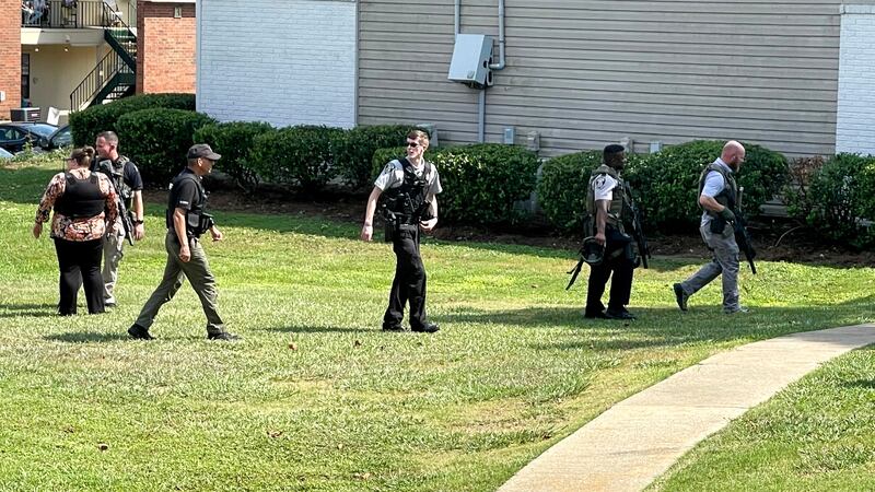 This was the scene at River Creek Apartments, 2525 Center West Parkway, after SWAT ...