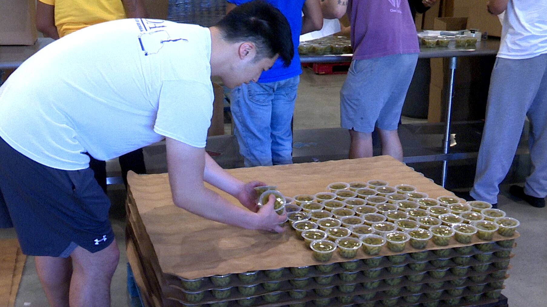 of the Augusta University community volunteer at Golden Harvest Food Bank on April 24,...