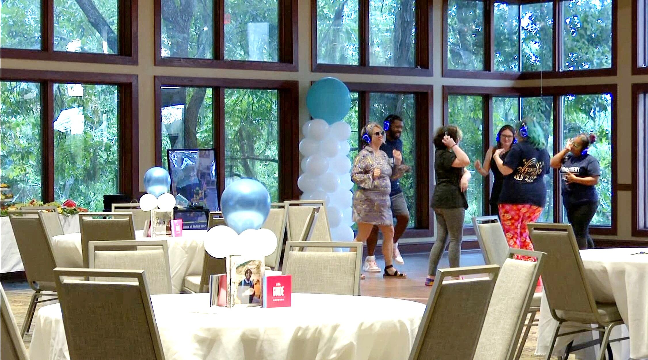 Soar Academy gifts scholarship during sensory friendly event