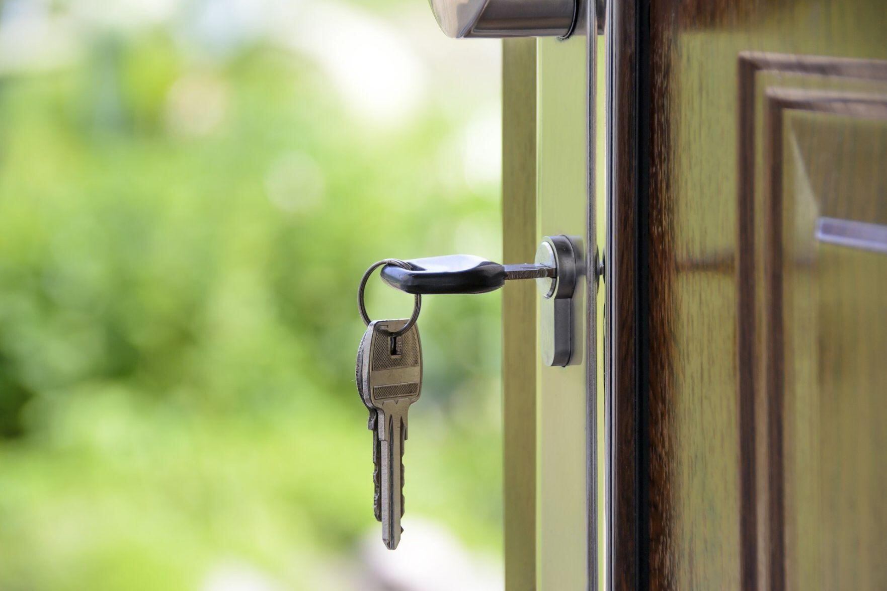 House with keys in front door