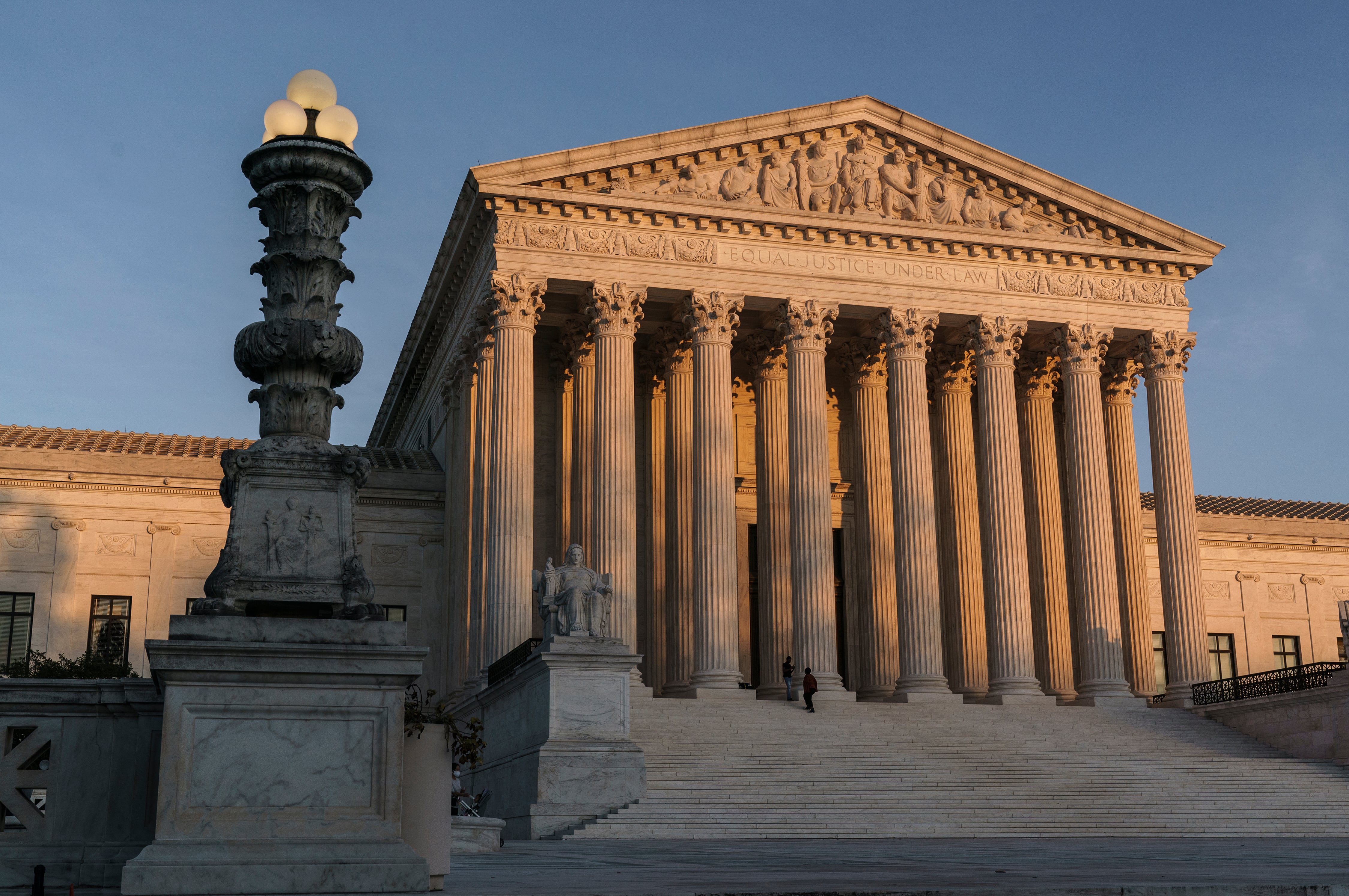 FILE - The Supreme Court is seen at sundown in Washington, Nov. 6, 2020.