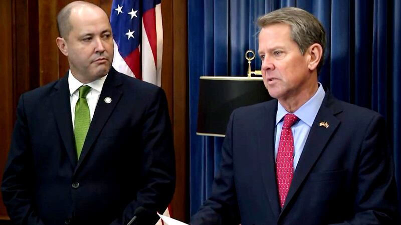 From left, Georgia Attorney General Chris Carr and Gov. Brian Kemp participate in a news...