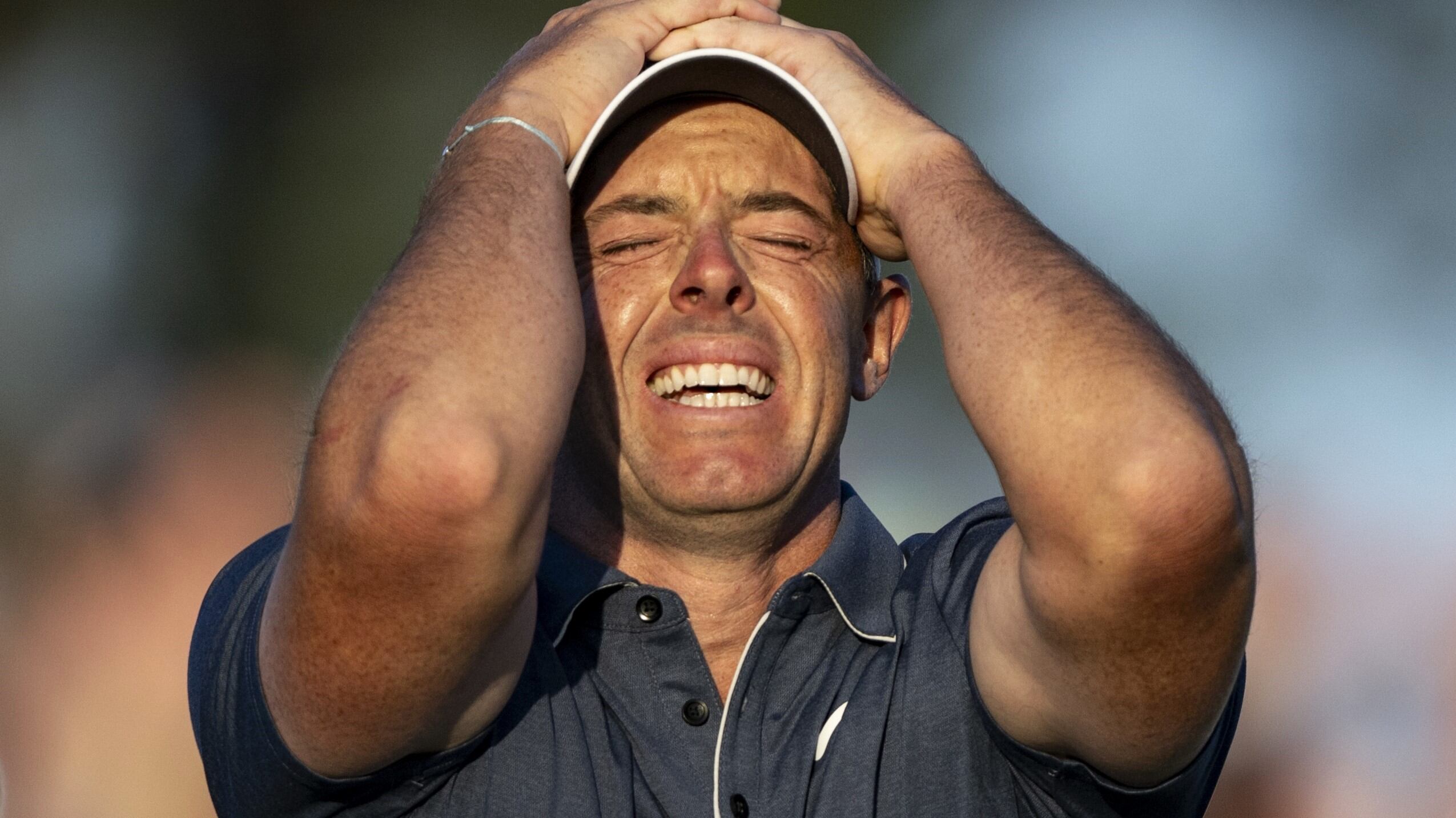 Masters champion Rory McIlroy of Northern Ireland celebrates after winning the Masters in a...
