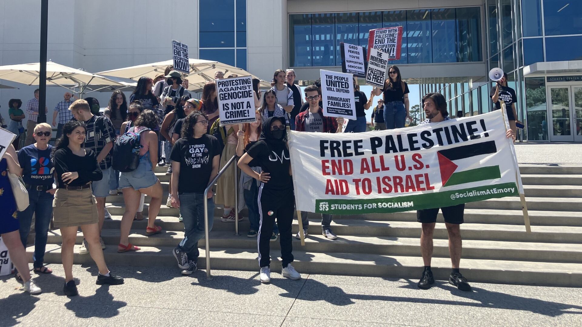 Students rally against student visa revocations.