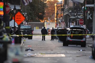 Emergency services attend the scene after a vehicle drove into a crowd on New Orleans' Canal...
