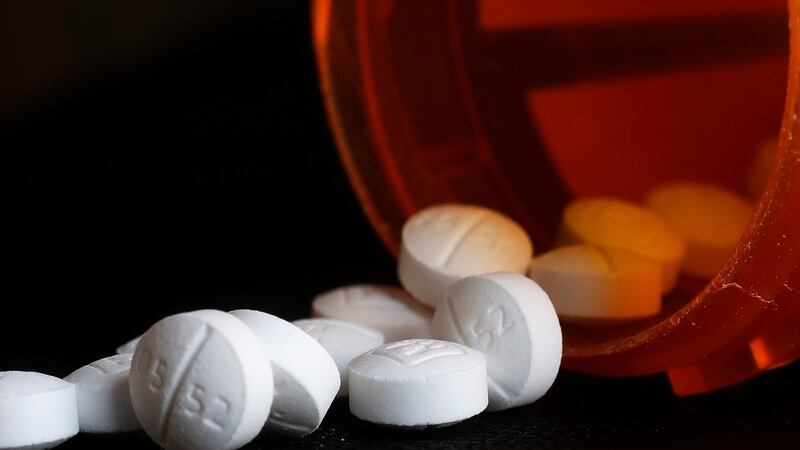 FILE — This Aug. 29, 2018, file photo shows an arrangement of Oxycodone pills in New York.
