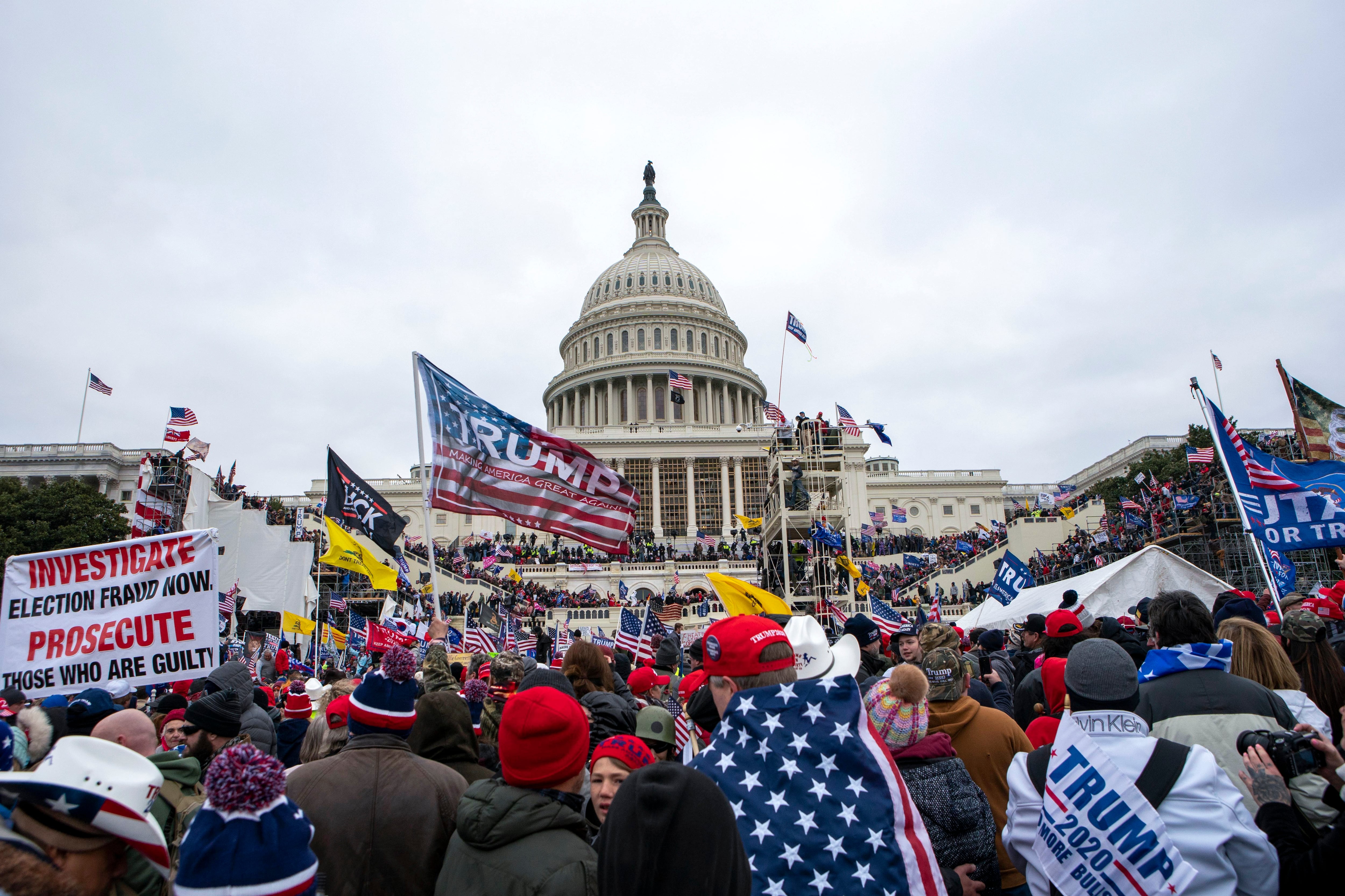 FILE - Insurrections loyal to President Donald Trump rally at the U.S. Capitol in Washington...