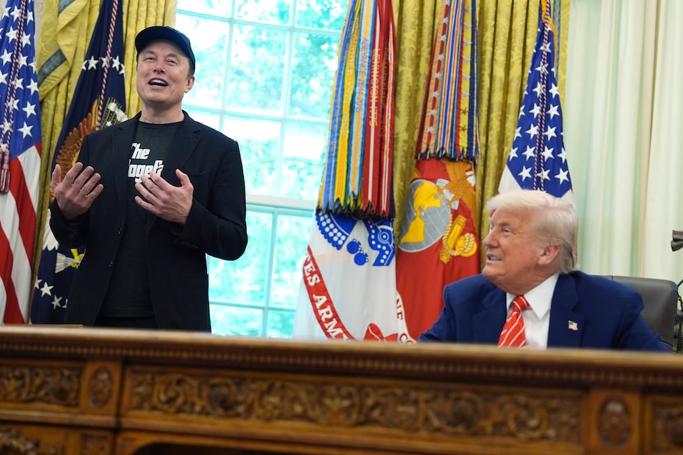 Elon Musk speaks during a news conference with President Donald Trump in the Oval Office of...