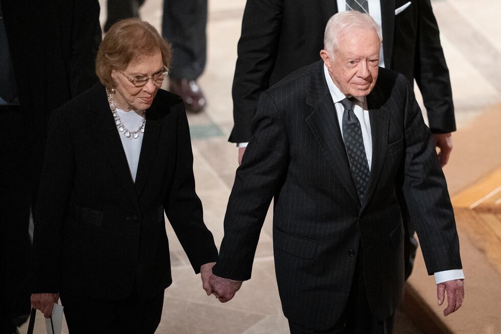 FILE - Former President Jimmy Carter, right, and his wife, former first lady Rosalynn Carter,...