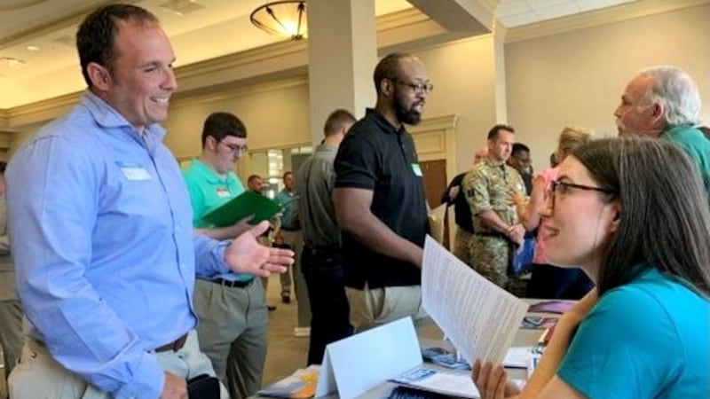 Savannah River Nuclear Solutions IT employee Nicole Arnold interviews one of nearly 300 job...