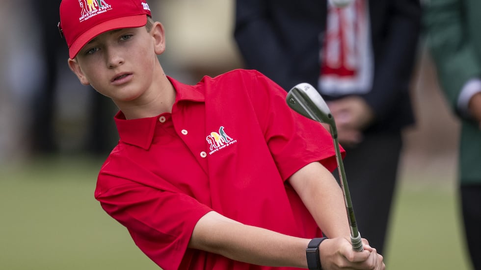 Colton Johnson of the Boys 12-13 group competes in the chipping discipline during the Drive,...