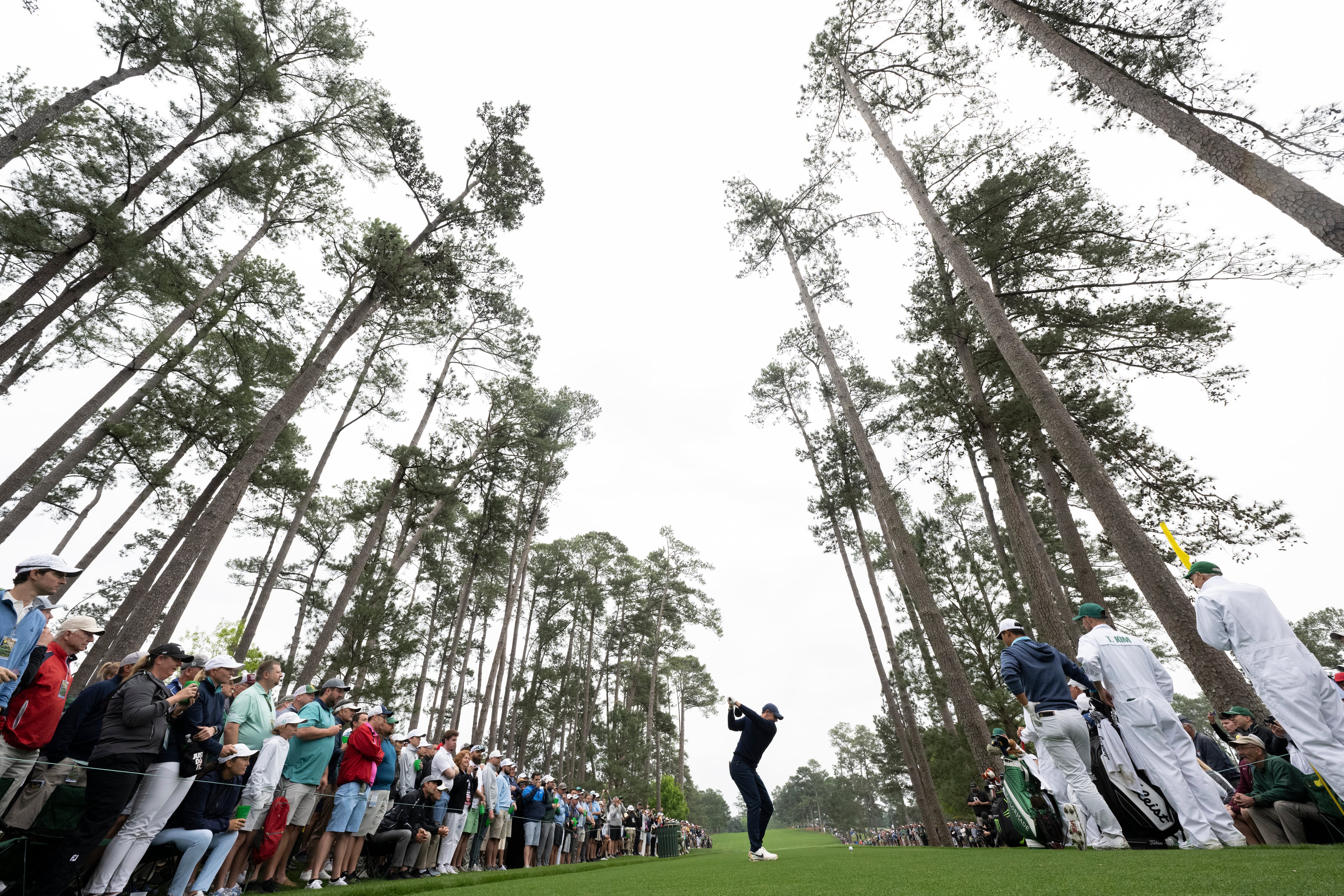 Rory McIlroy of Northern Ireland plays a stroke from the No. 17 tee during practice round 1 at...