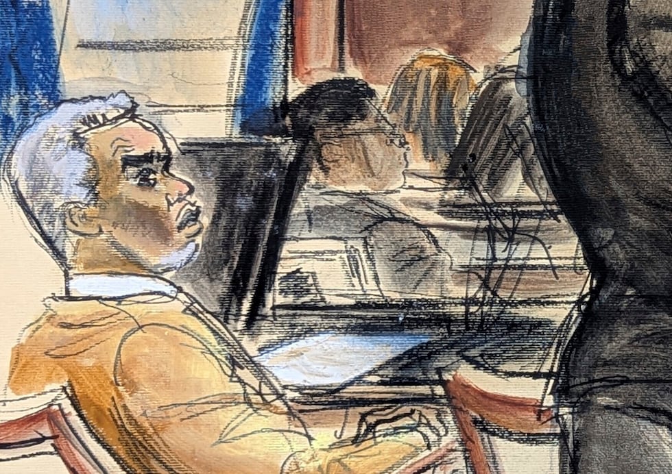 Sean "Diddy" Combs looks on as defense attorney Nicole Westmoreland cross examines Dawn...